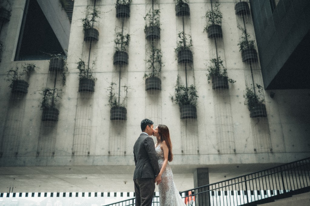 A kiss beneath the living wall